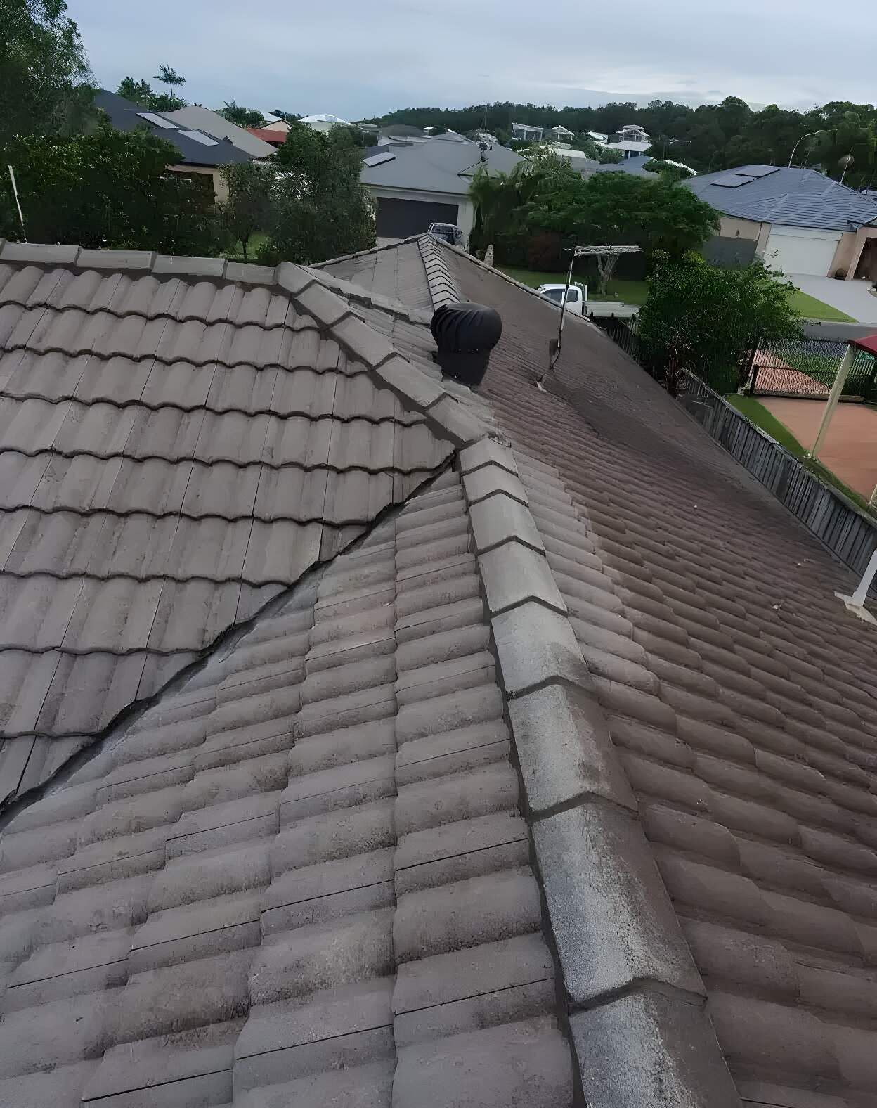 The Roof of a House With a Chimney — Magic Wand Roof Restoration & Painting in Kingscliff, NSW