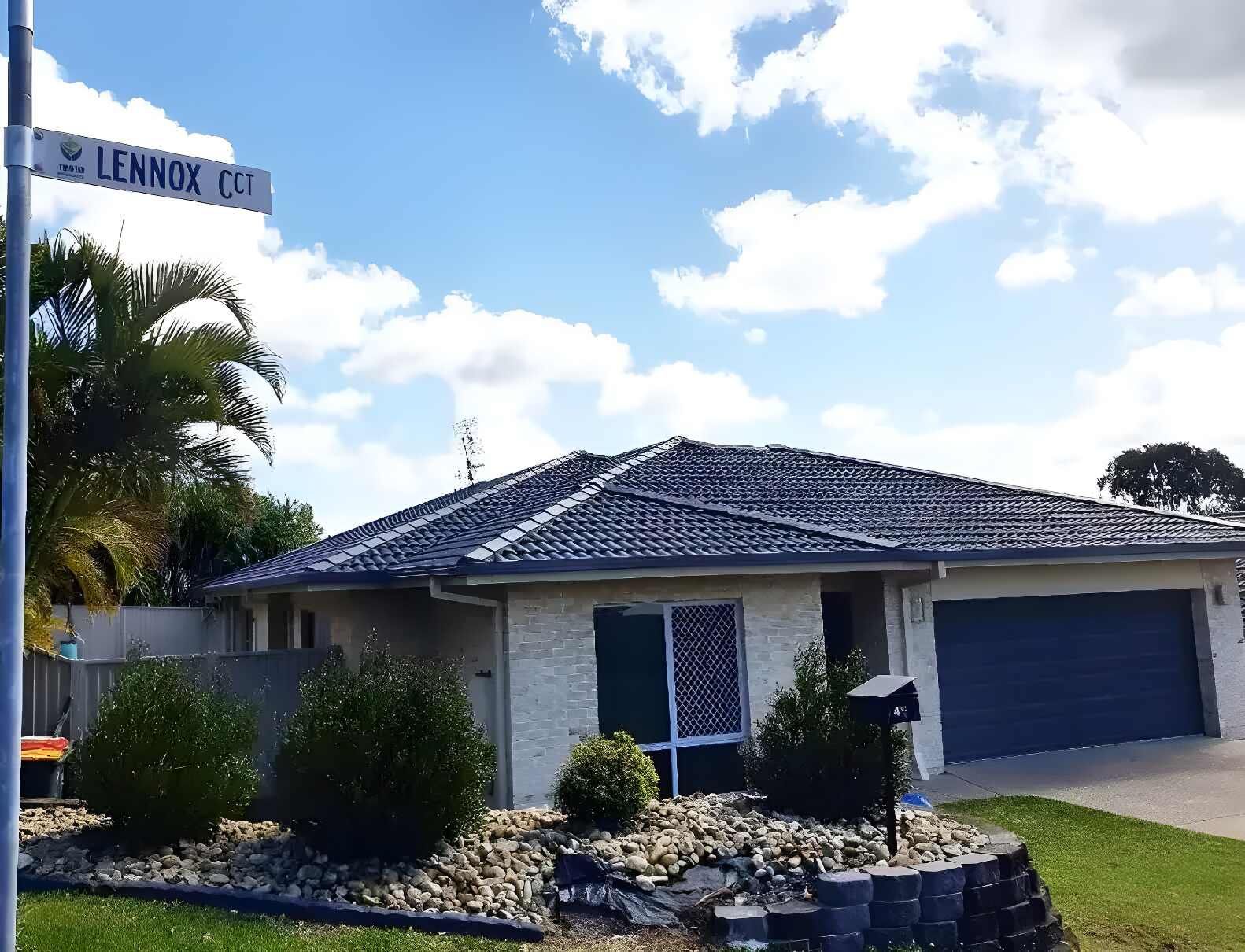 A House is on the Middle of the Palm Tree — Magic Wand Roof Restoration & Painting in Mermaid Beach, QLD