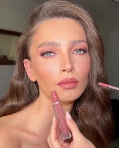 A Woman Is Getting Her Makeup Done By A Makeup Artist — Mackay Skin Clinic In North Mackay, QLD