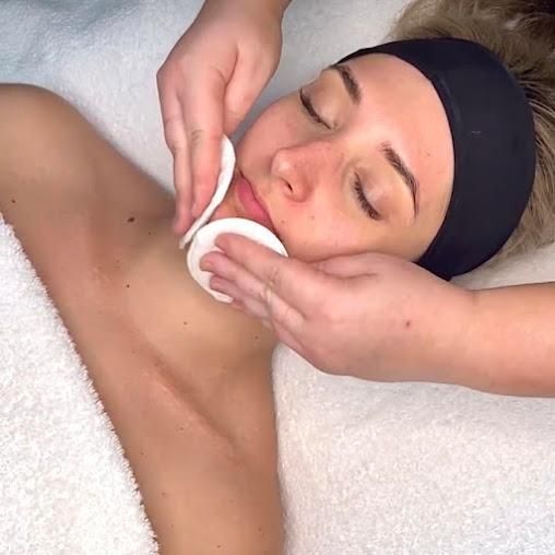 A Woman Is Getting A Facial Treatment At Skin Clinic — Mackay Skin Clinic In North Mackay, QLD