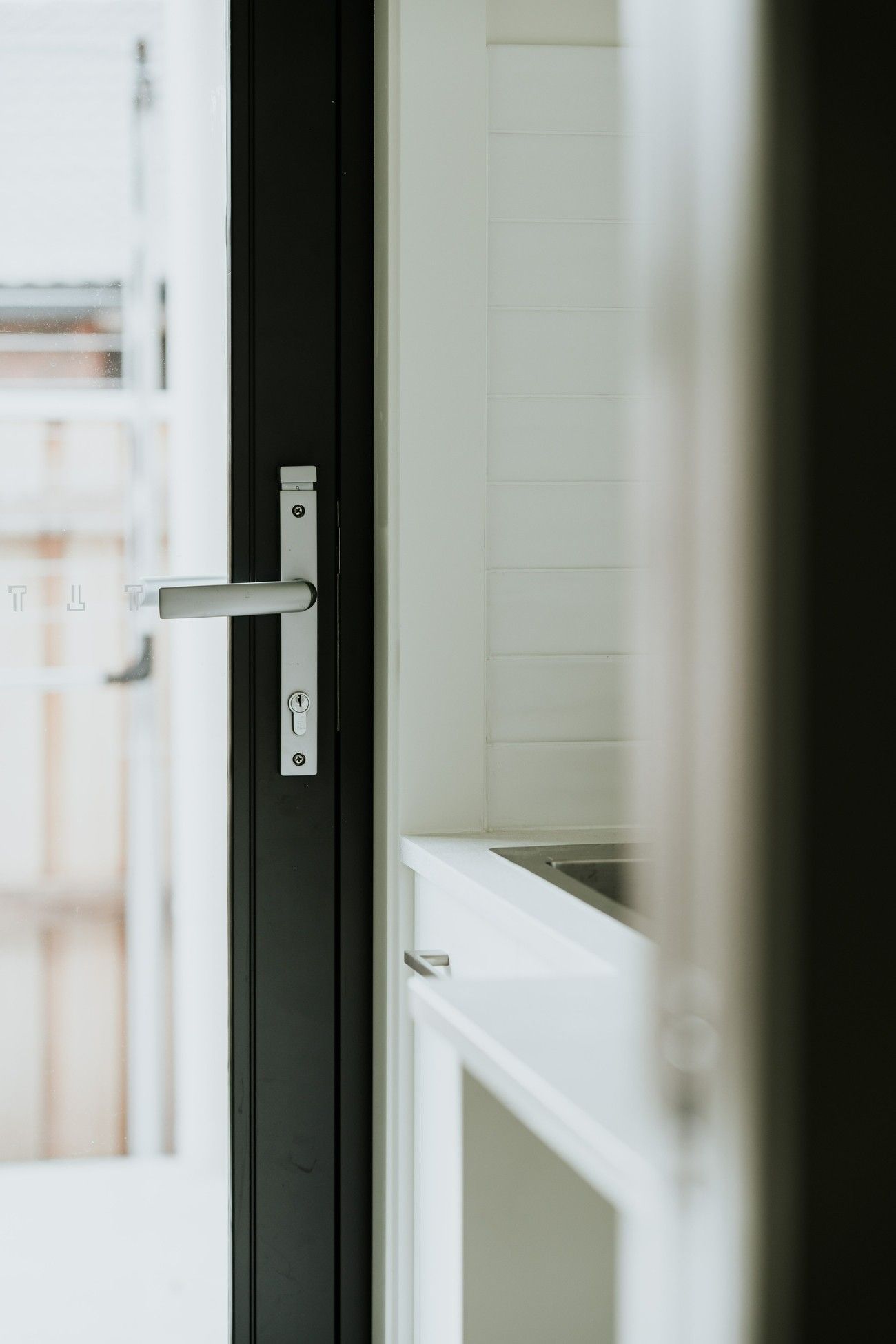 A Close Up of a Door Handle in a Kitchen — Imperial Build Co. in Weston Creek, ACT
