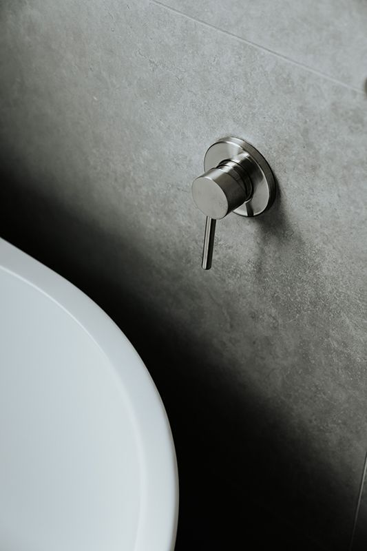 A Close up Of a Toilet and Sink in A Bathroom — Imperial Build Co. in  Coombs, ACT