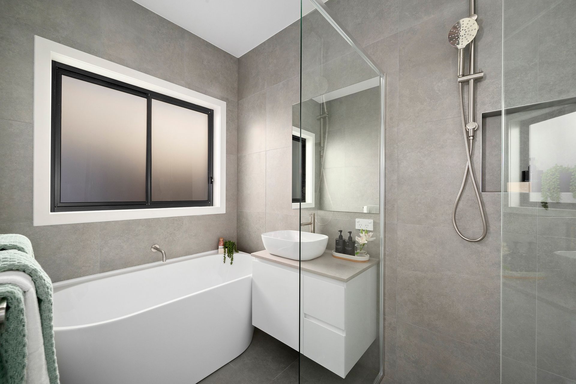 A Bathroom With a Sink and a Walk in Shower — Imperial Build Co. in Coombs, ACT