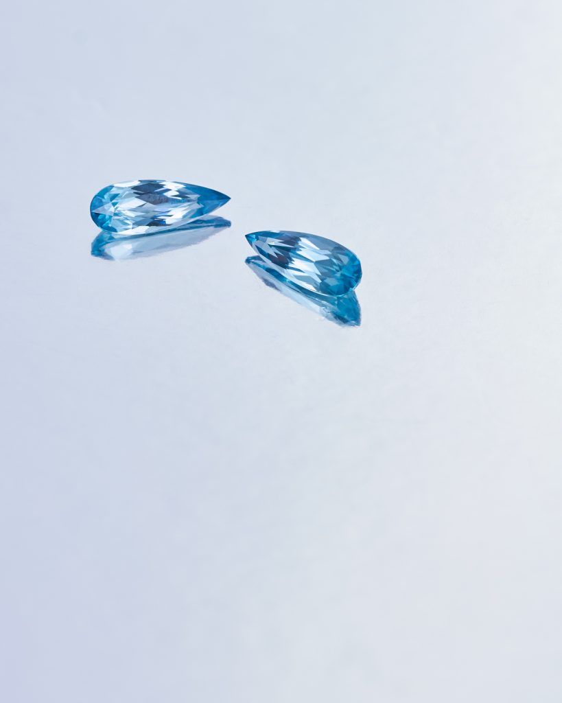 Pair of tear drop light blue stones