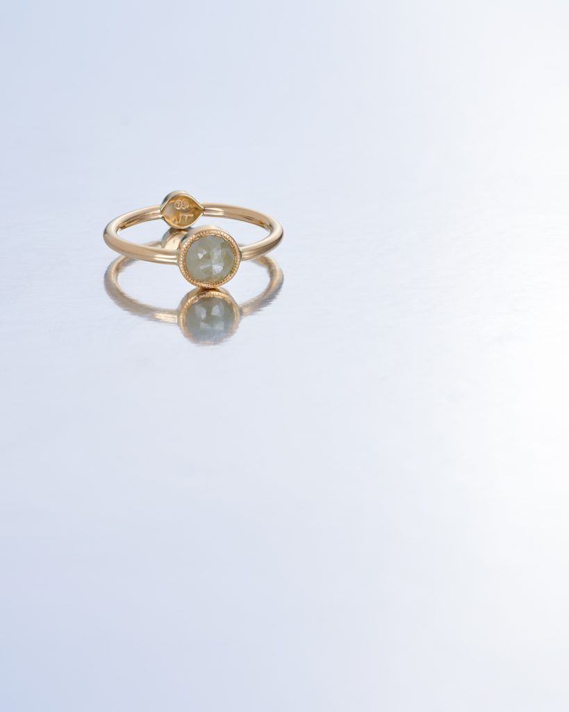 circular ring with white stone