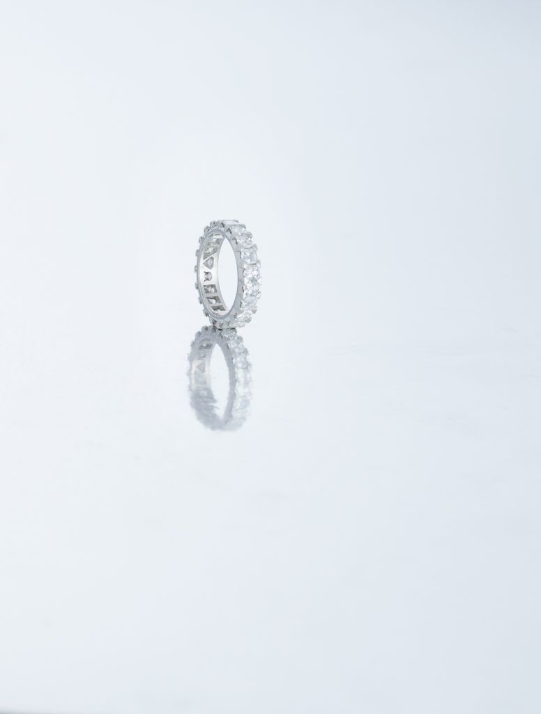 Silver ring with diamonds all around