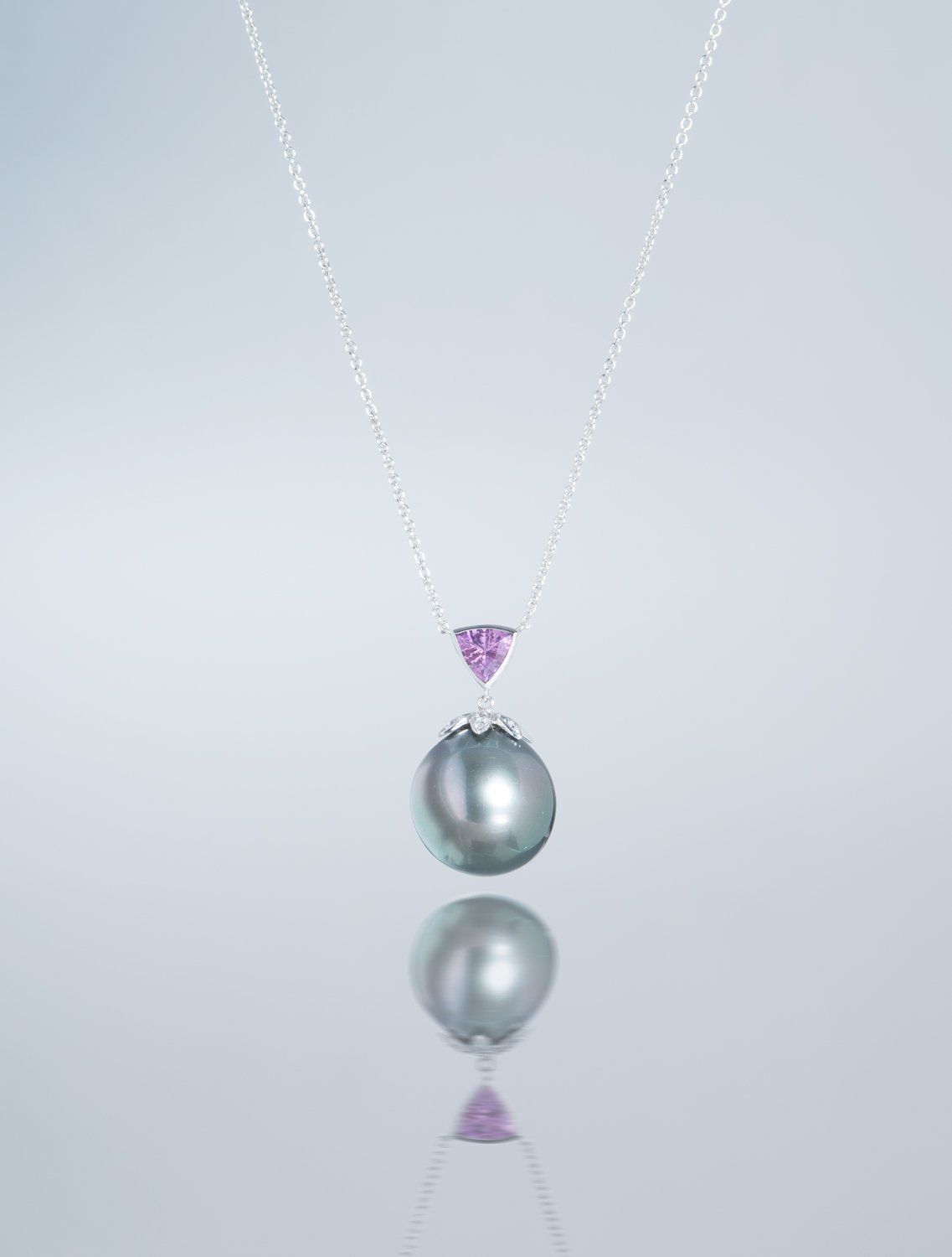 Pearl reckless with purple stone