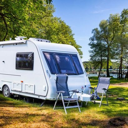 Camping trailer on the lake shore, Masuria, Poland