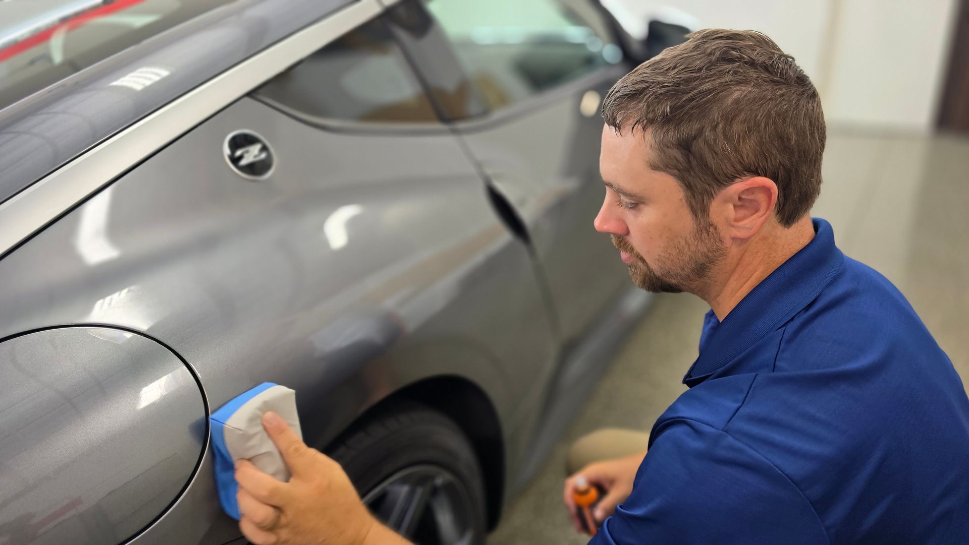 Ceramic coating application on Nissan sedan