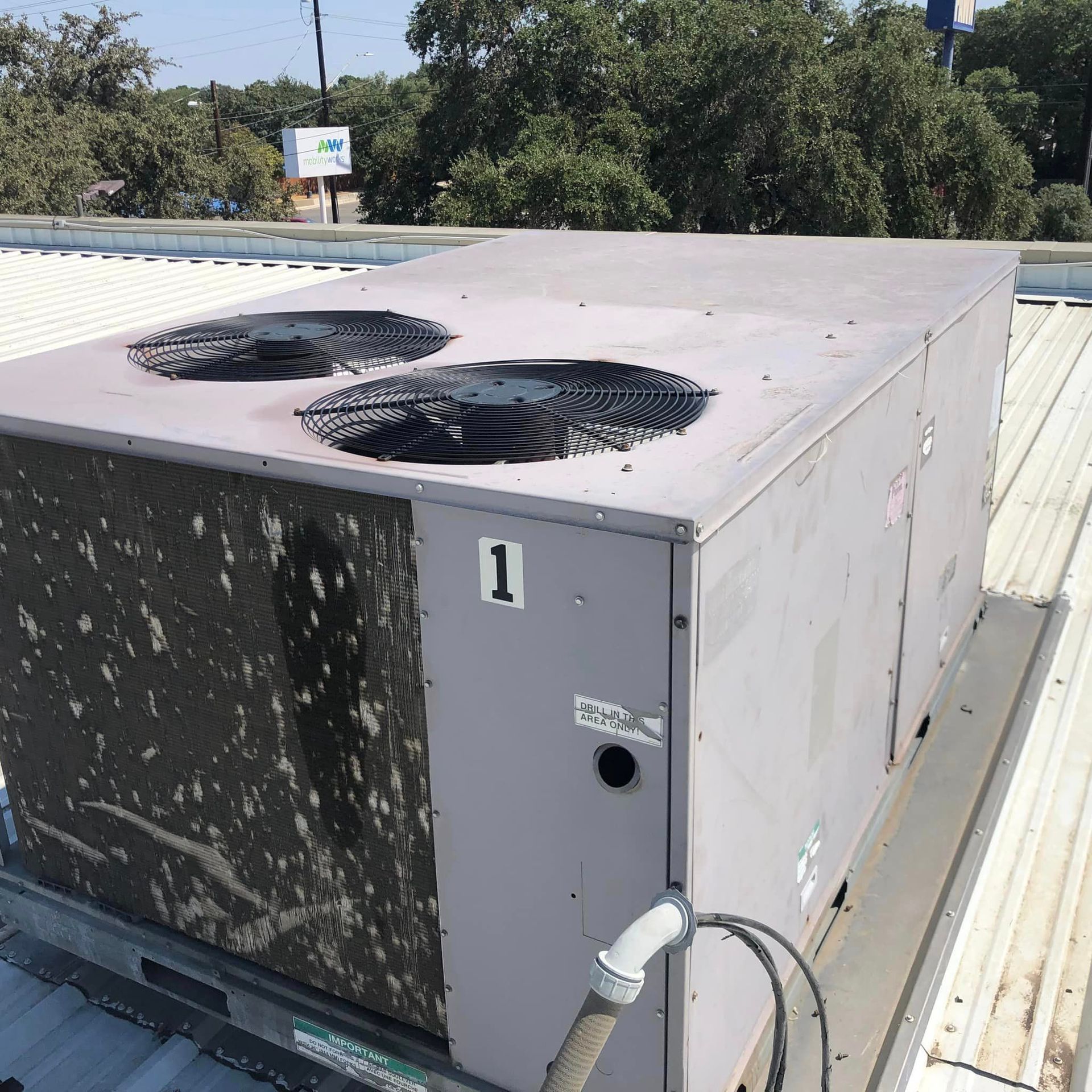 An air conditioner with the number 1 on it