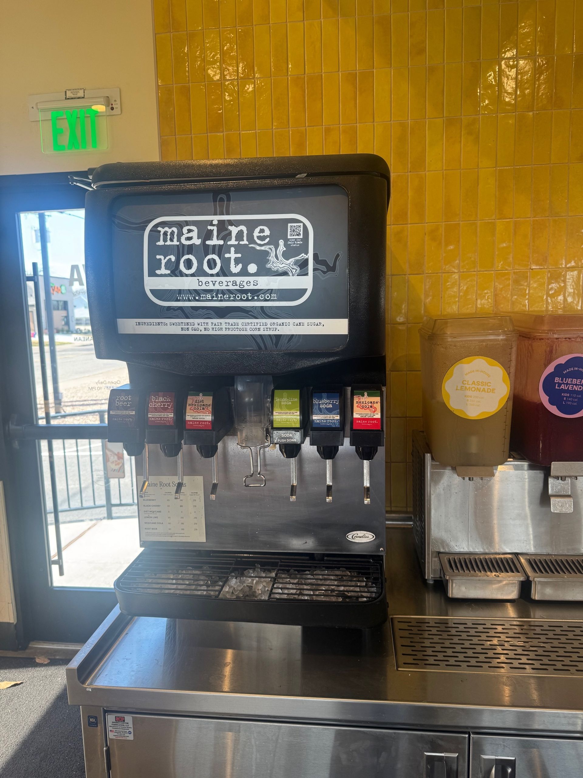 An aerial view of a parking lot with a truck and a van