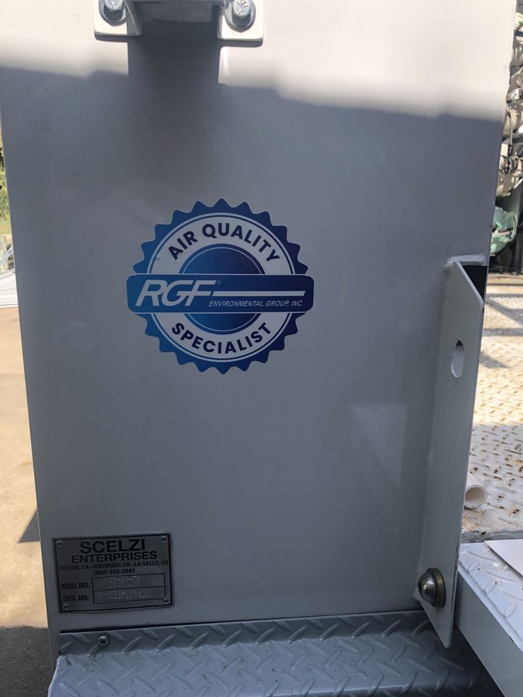 A white box with a sticker on it that says air quality specialist