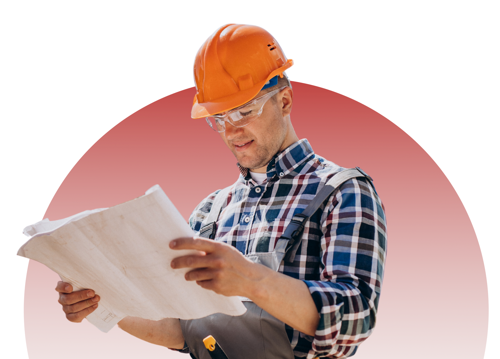 A man wearing a hard hat and safety glasses is looking at a blueprint.