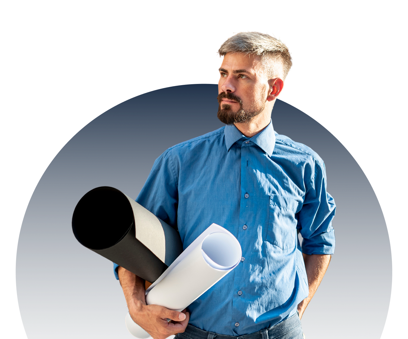 A man in a blue shirt is holding three rolls of paper.