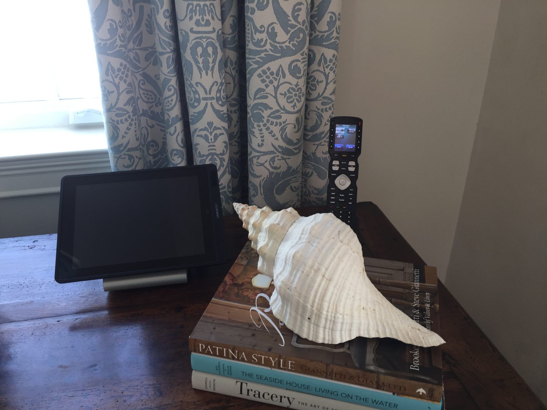 Books And Device On The Wooden Table — Santa Rosa Beach, FL — Sound Decision