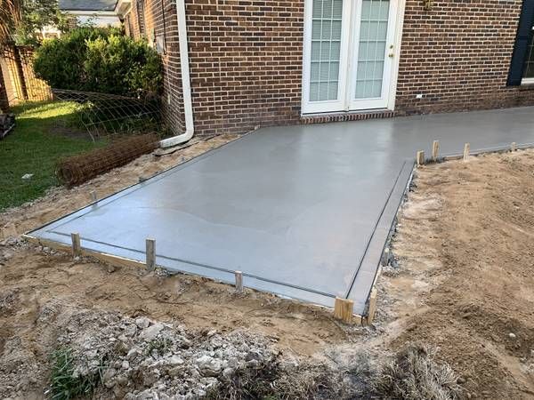 Outdoor concrete patio installation by Addison Concrete Contractors