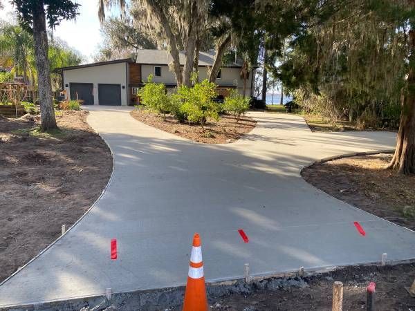 Modern concrete driveway with clean edges and smooth finish