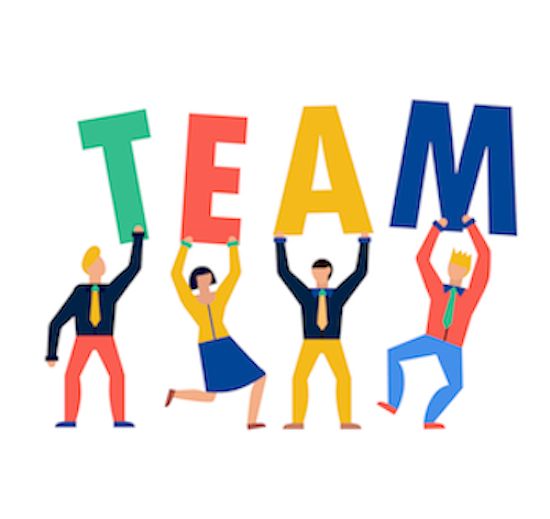 Four people holding up each letter that spells 'TEAM'.