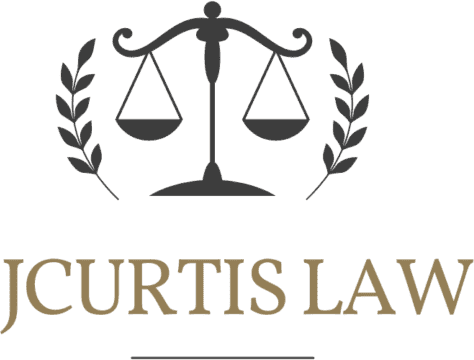 Logo for JCURTIS LAW featuring a scale of justice icon above the text in a serif font.