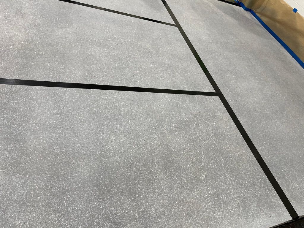 A concrete floor and foundation with moisture control and prevention methods installed.