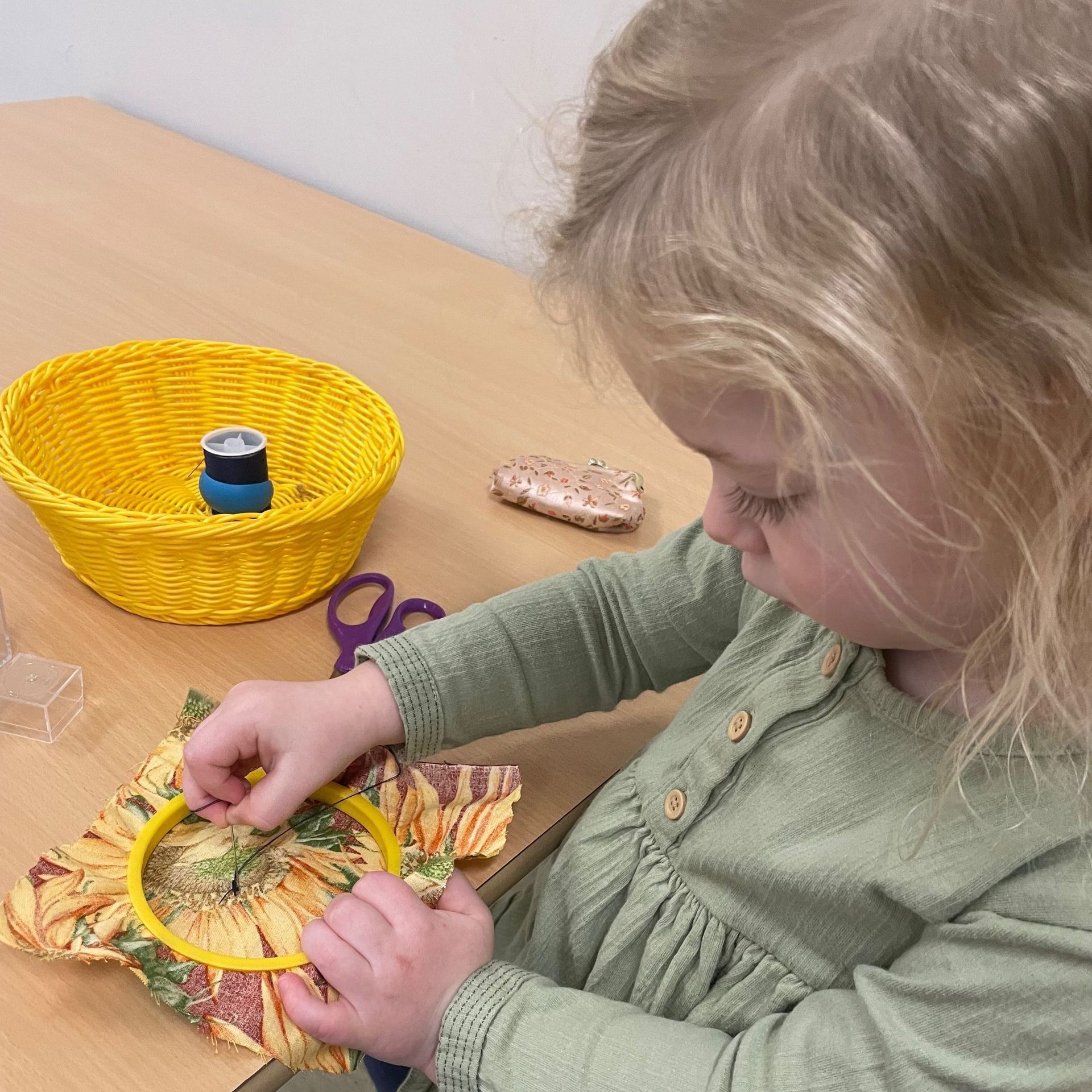 Montessori child working on practical life skills