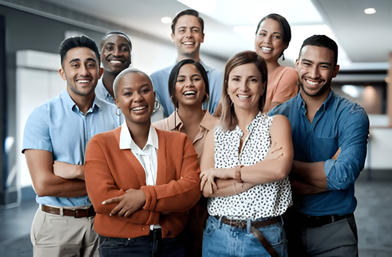 A group of people are looking at a laptop computer.