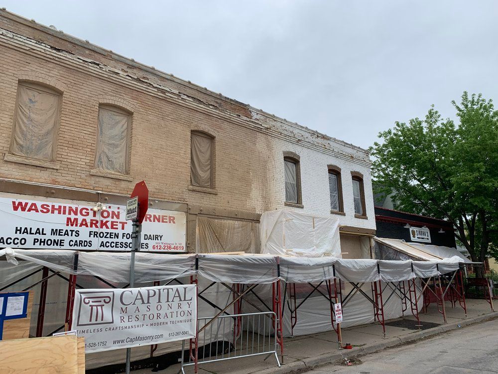 A washington market is being built on the side of a building.