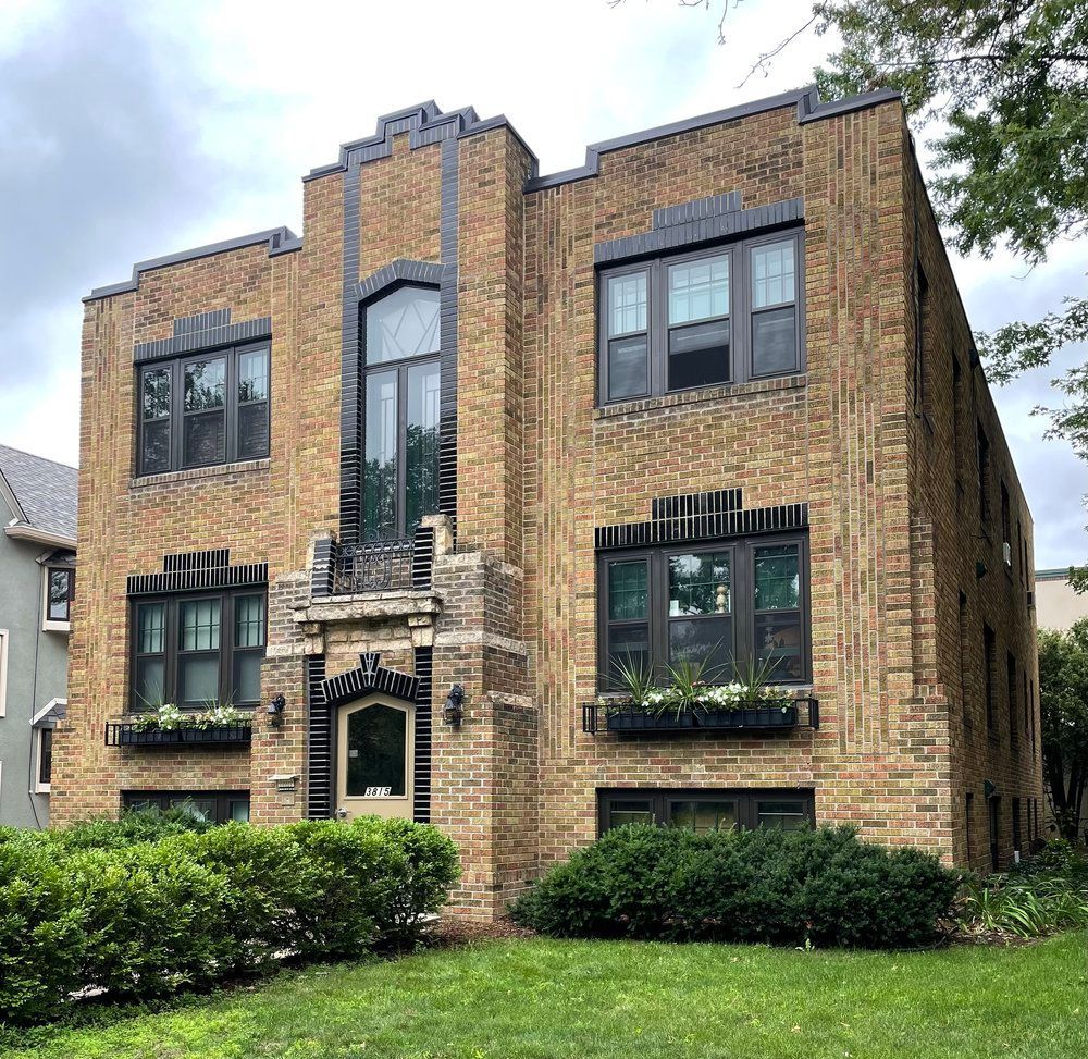 A large brick building with a lot of windows