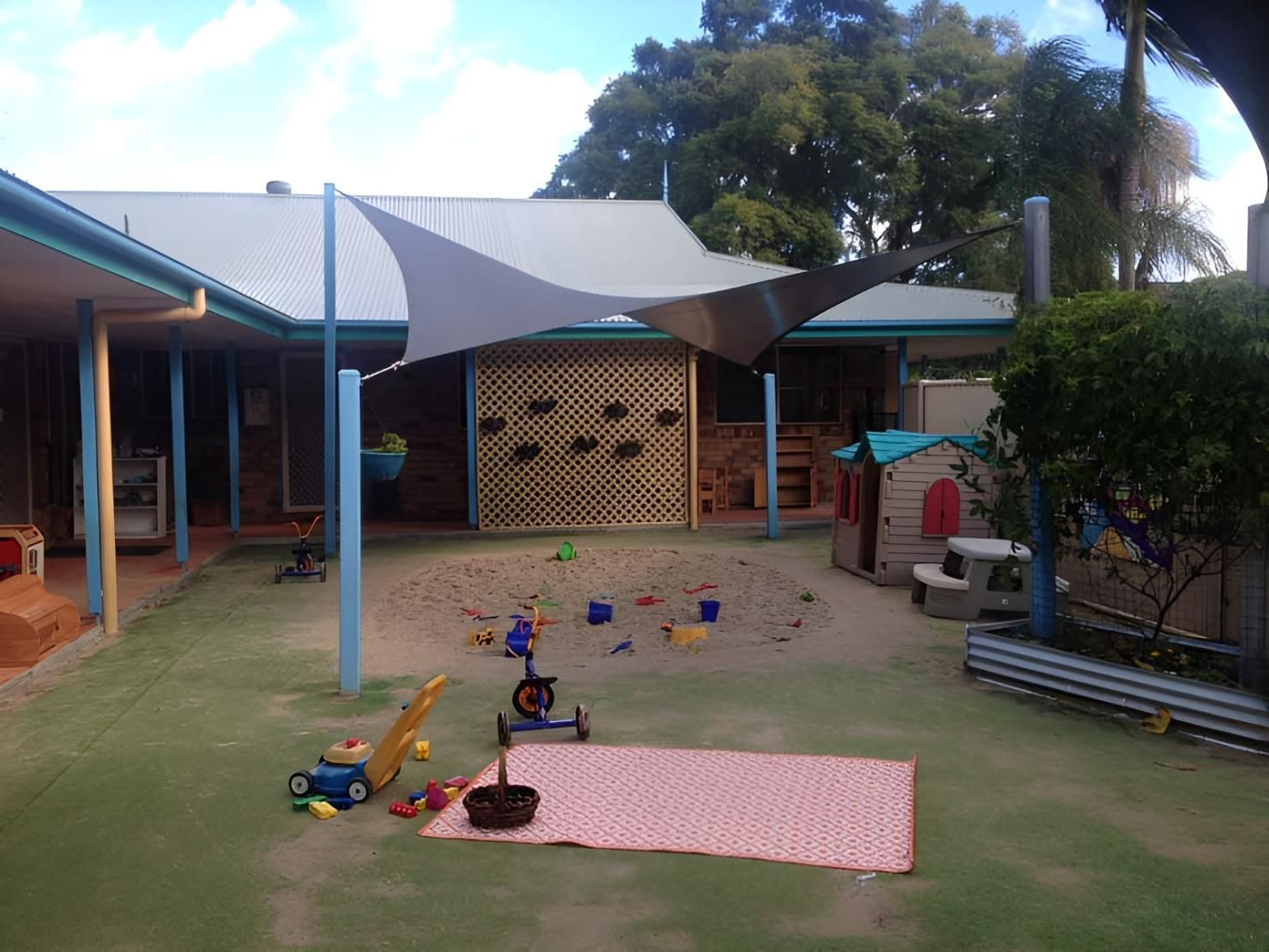 There is a Picnic Blanket in The Middle of The Courtyard — Jon Wilson Canvas & Shade in Port Macquarie, NSW