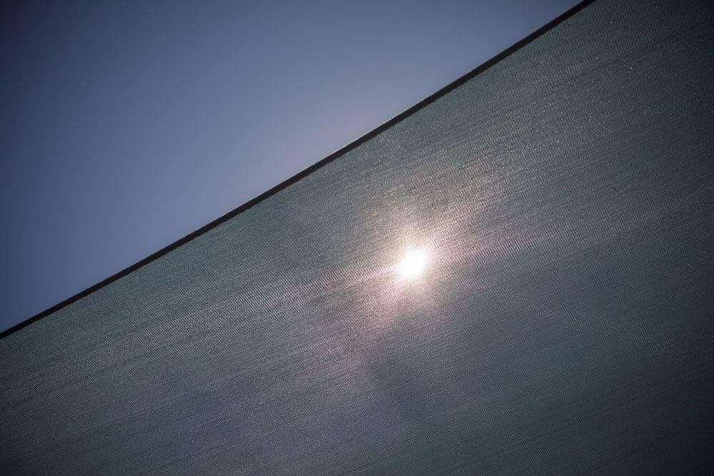 The Sun Is Shining Through the Roof of A Building — Jon Wilson Canvas & Shade in Coffs Harbour, NSW