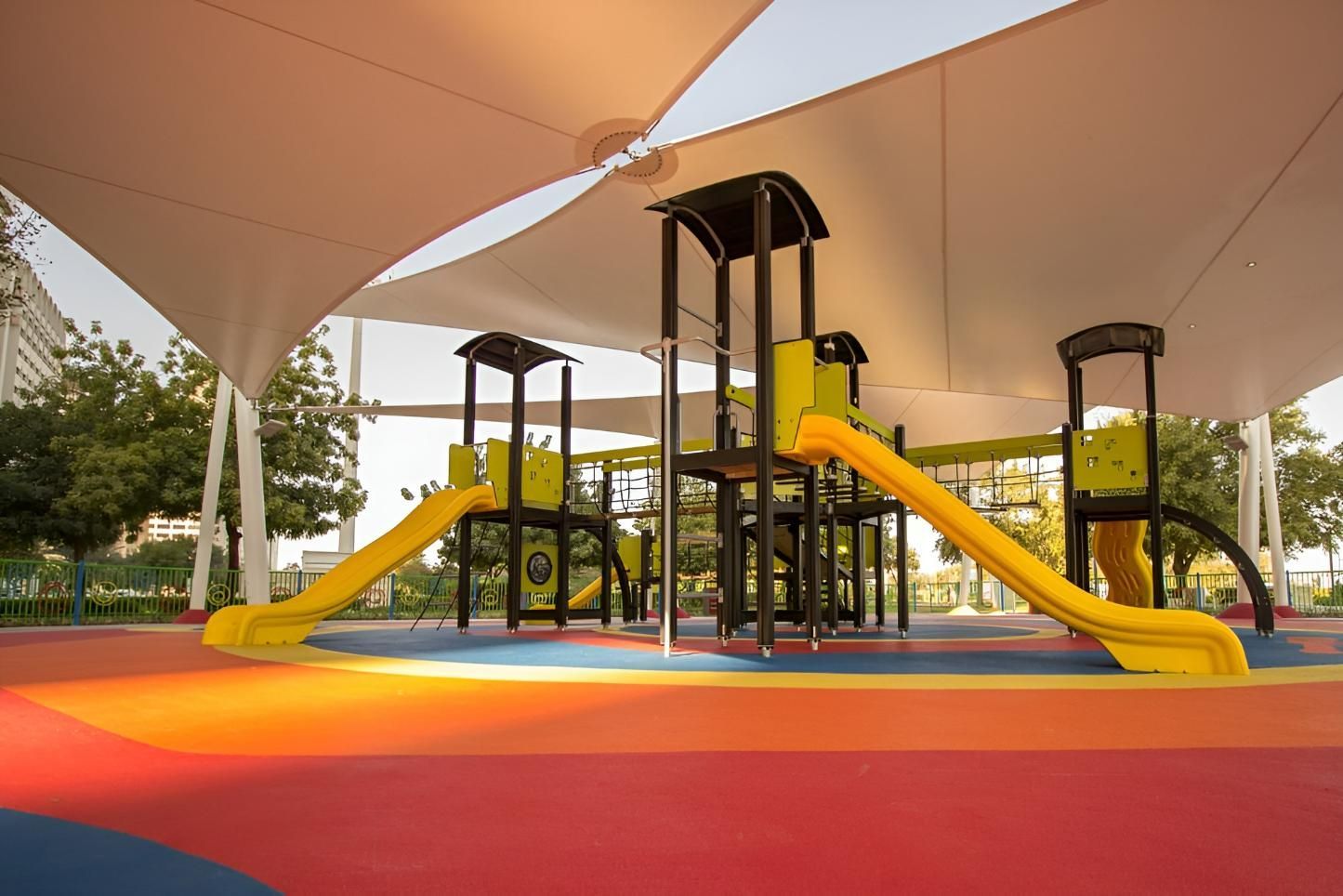 A Colorful Playground with A Slide and A Tower Under a Canopy — Jon Wilson Canvas & Shade in Coffs Harbour, NSW