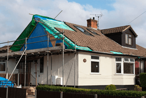 For building services in Essex call 01371 821 799 House with scaffolding around having a new roof installed