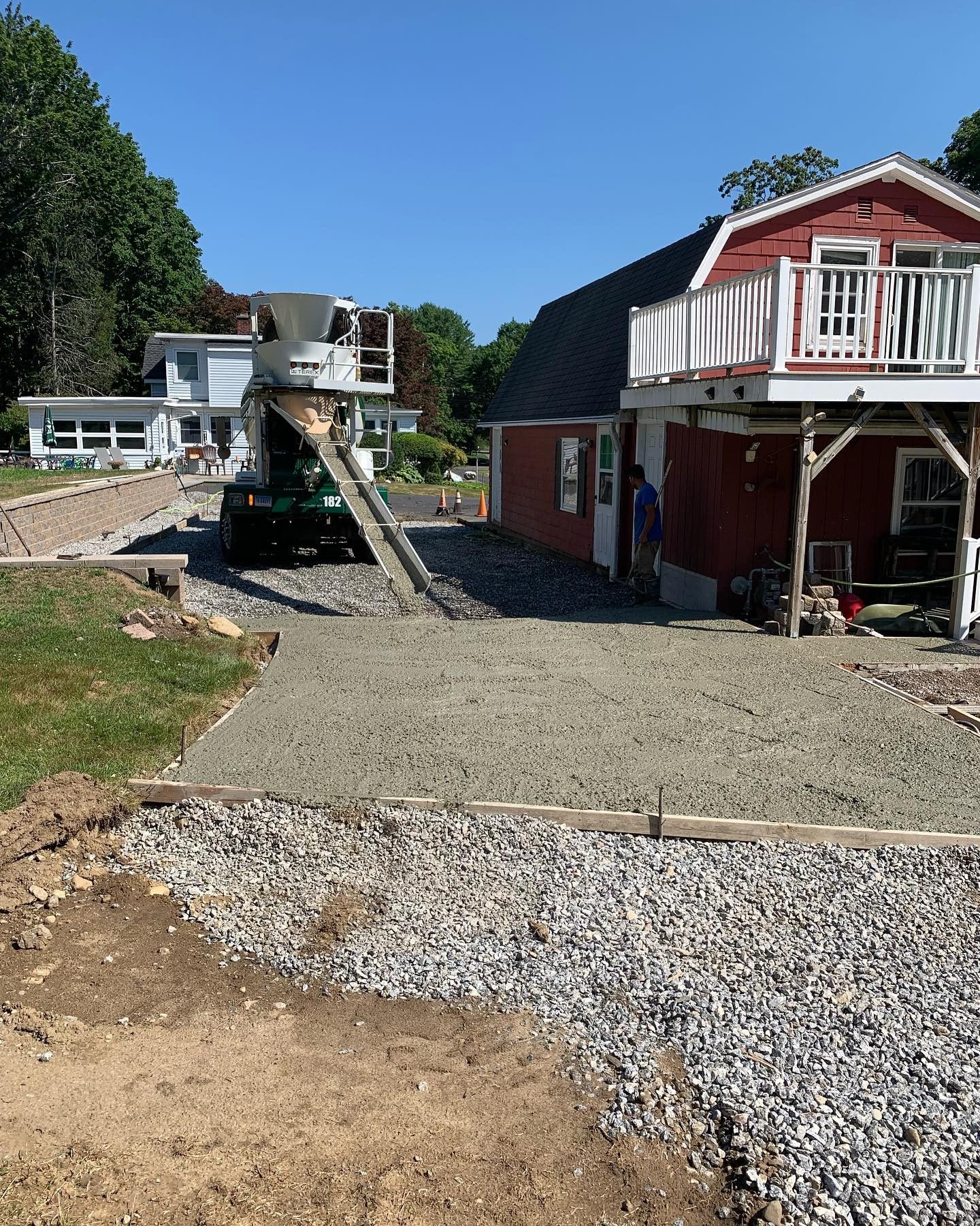 A truck is pouring concrete.