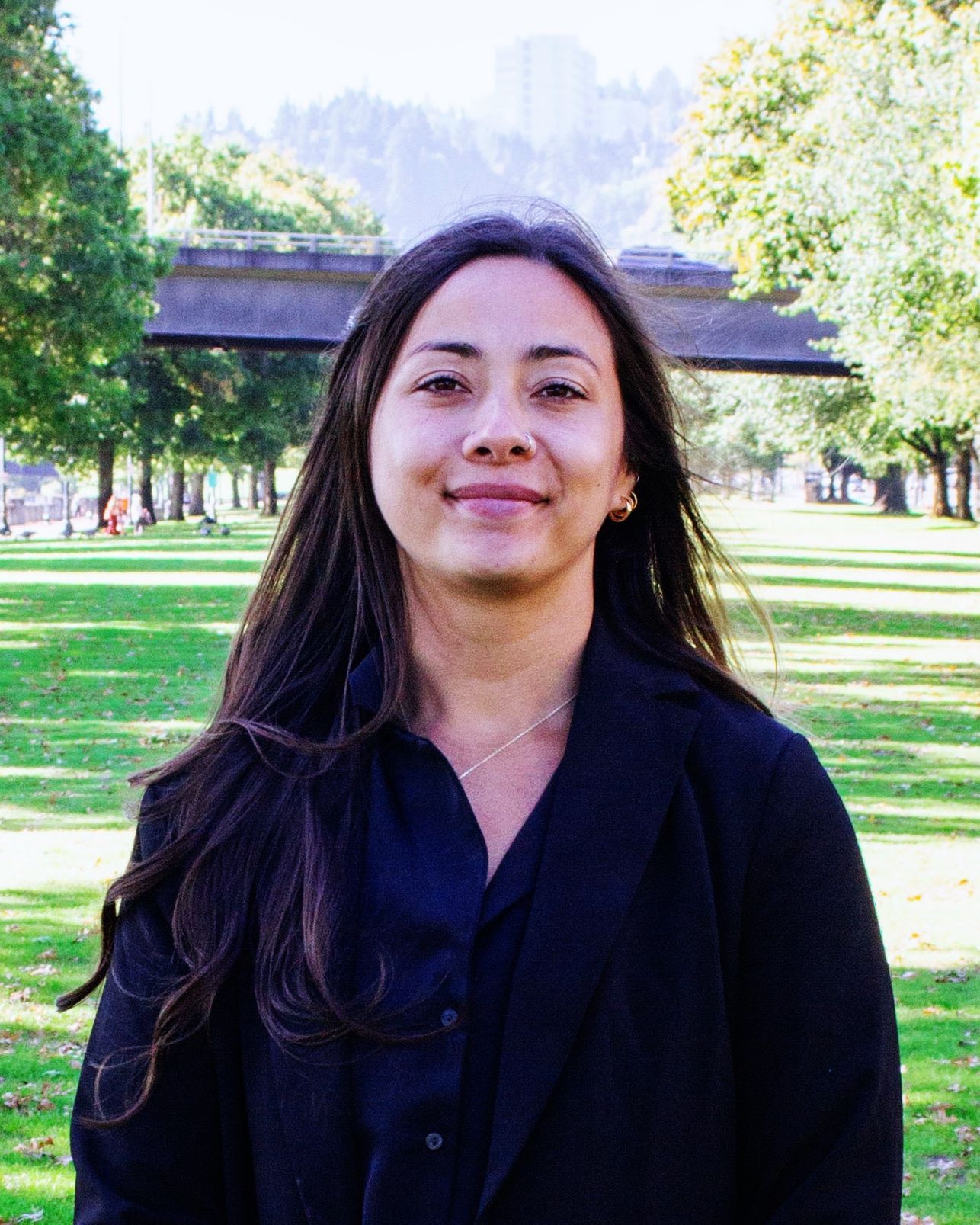 Kayla standing on green grass