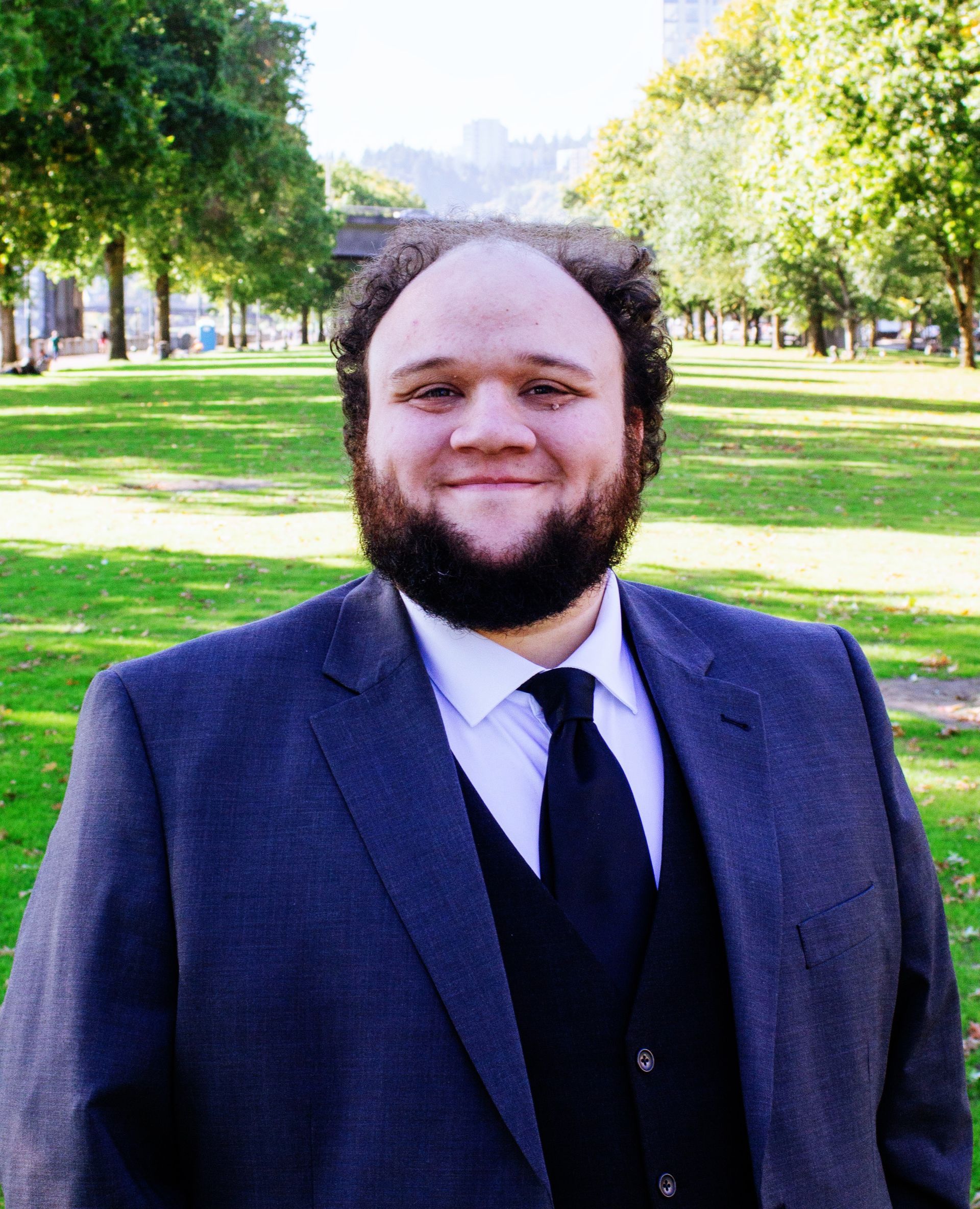 Reid standing on green grass