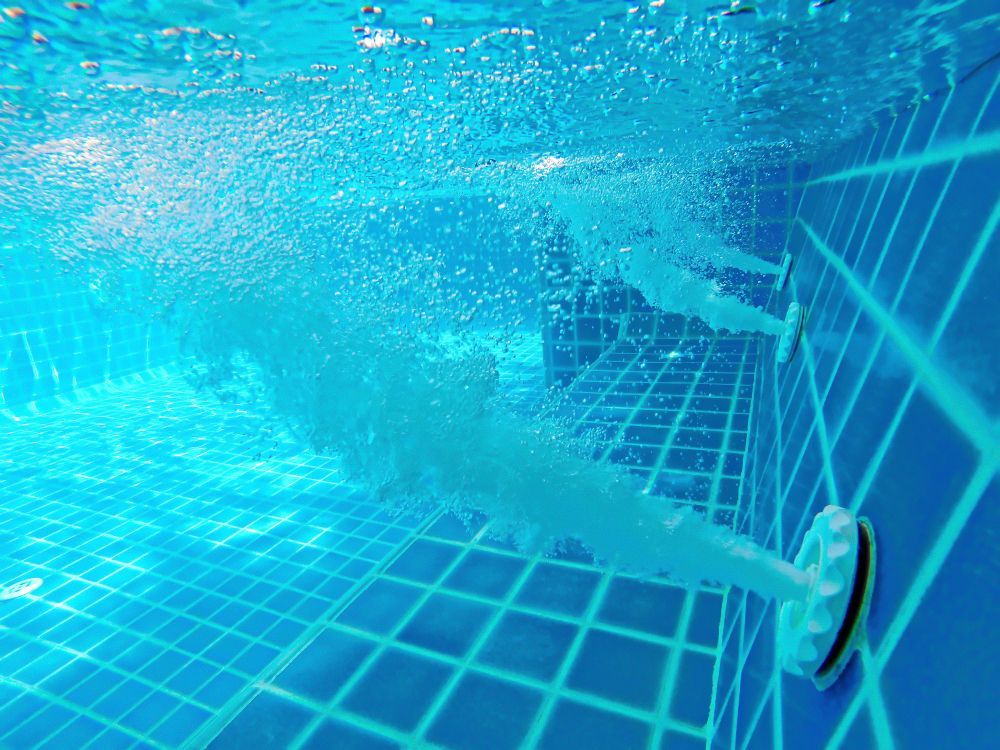 Underwater View of a Swimming Pool With Bubbles Coming Out of It — Lismore Poolscene in Lismore, NSW