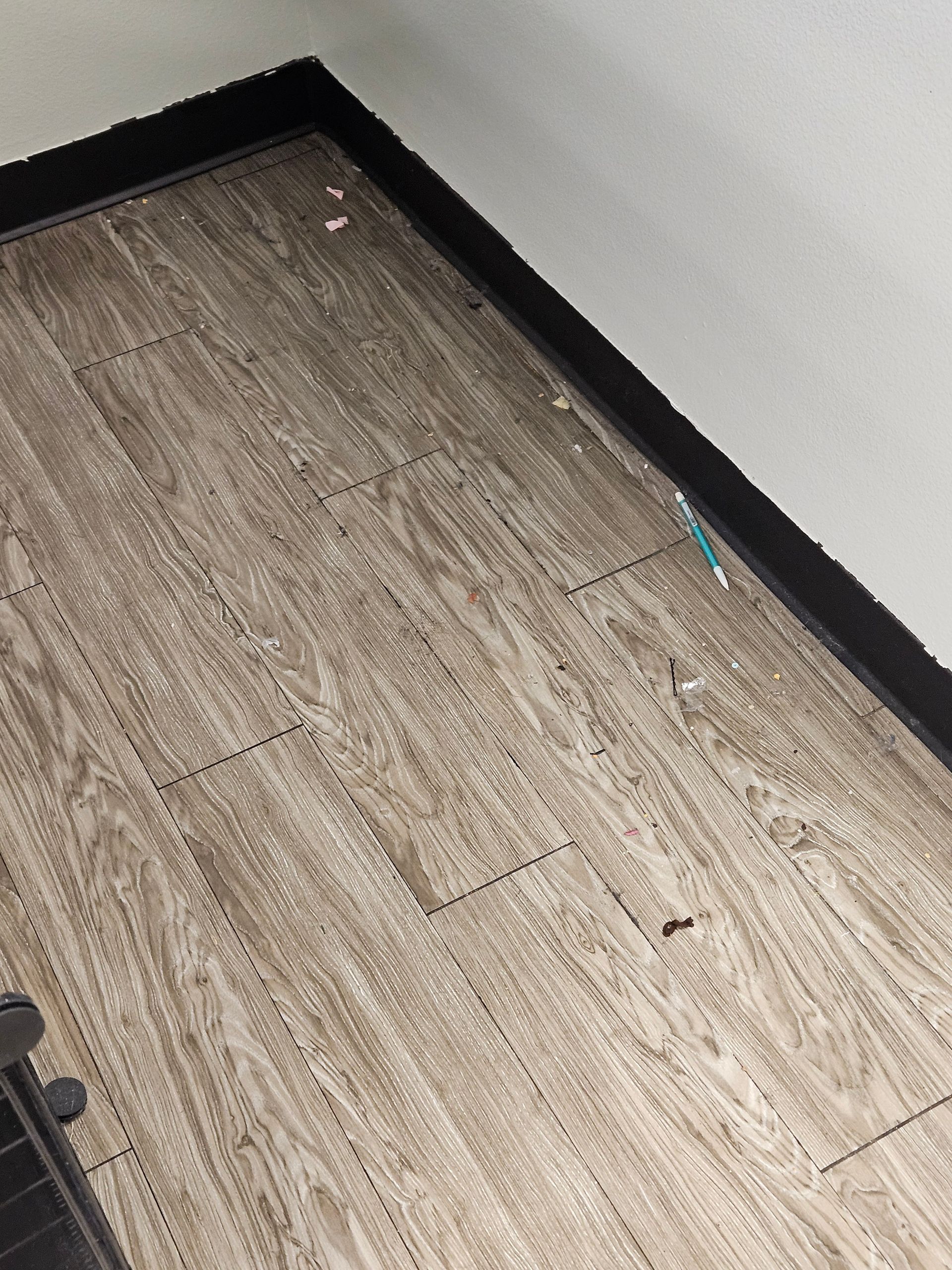 A close up of a tiled floor in a room.