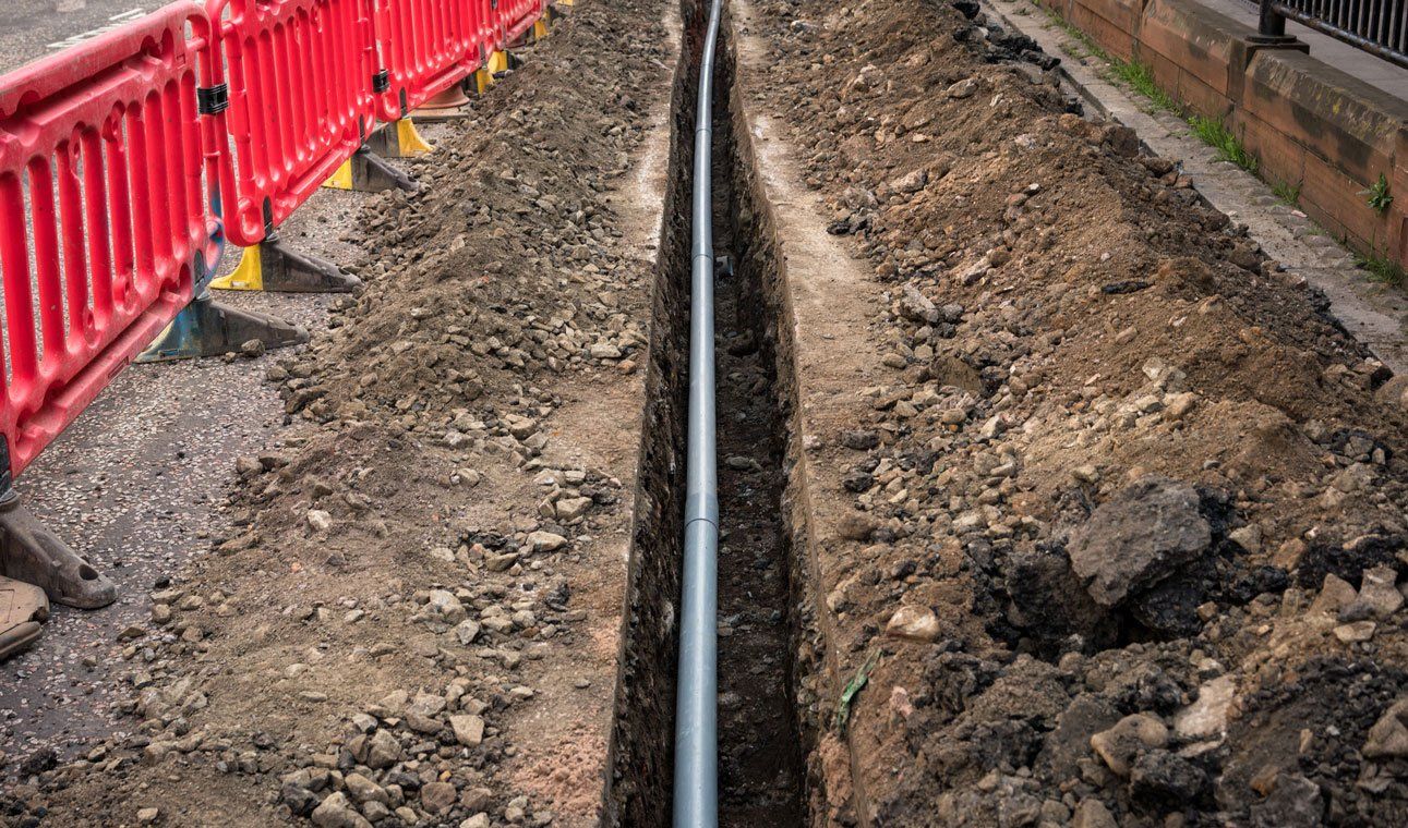 Pipe installation — Asheville, NC — Down To Earth Grading Inc.