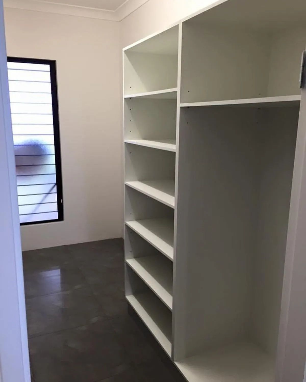 White Built-in Closet Shelving Unit With Open Clothing Storage — Keilbach Kitchens in Cassowary Coast, QLD