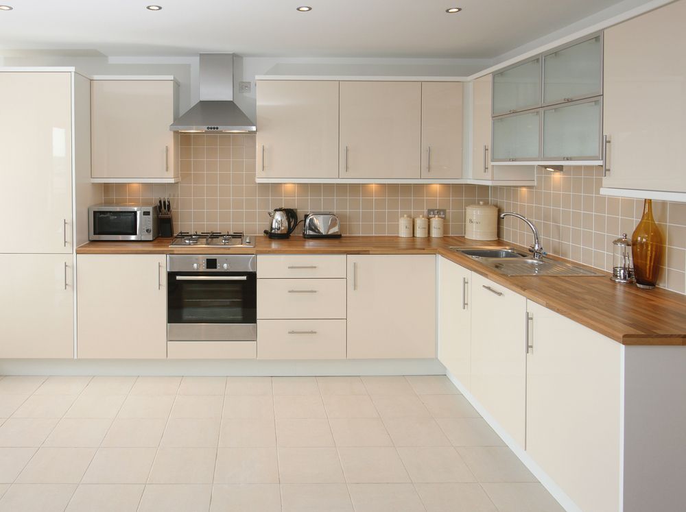 Cream-colored Kitchen With Light Wood Countertops — Keilbach Kitchens in Cassowary Coast, QLD