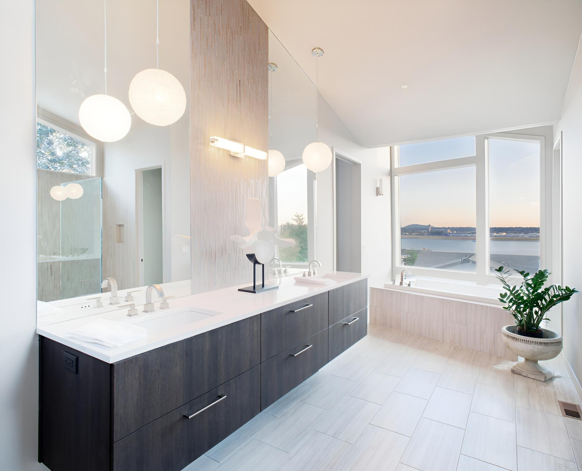 A Bathroom With Two Sinks, a Tub and a Large Mirror — Proud Cleaning Canberra in Amaroo, ACT