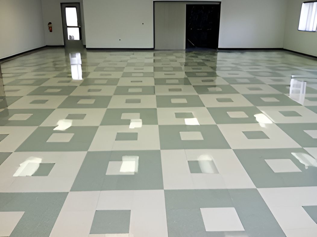 A Large Room With a Checkered Floor and White Walls — Proud Cleaning Canberra in Amaroo, ACT