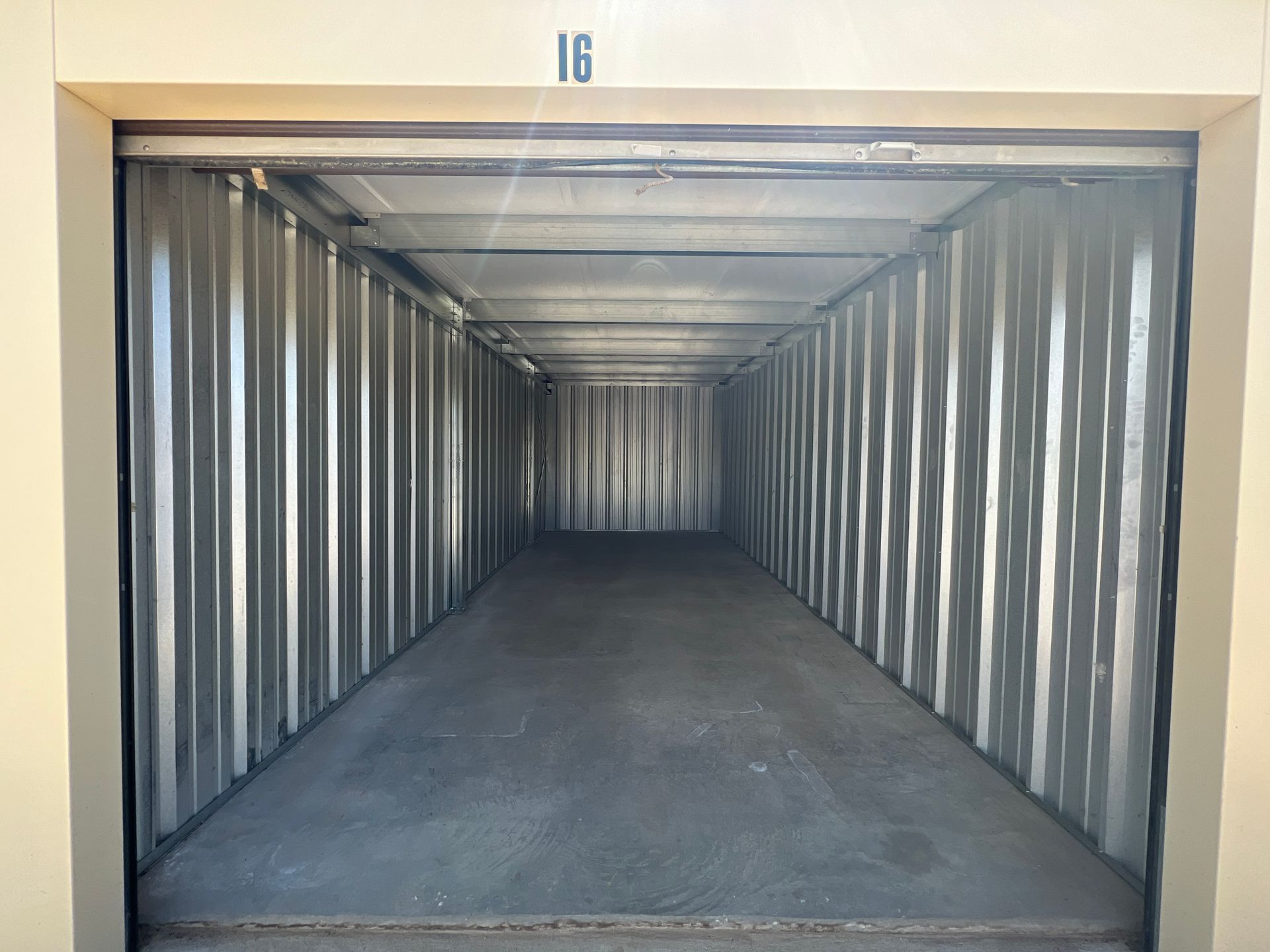 Inside of storage unit with metal walls.