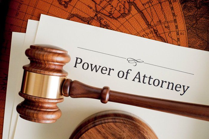 Power of Attorney Document and Gavel — Athens, AL — Alexander Corder & Shelly PC