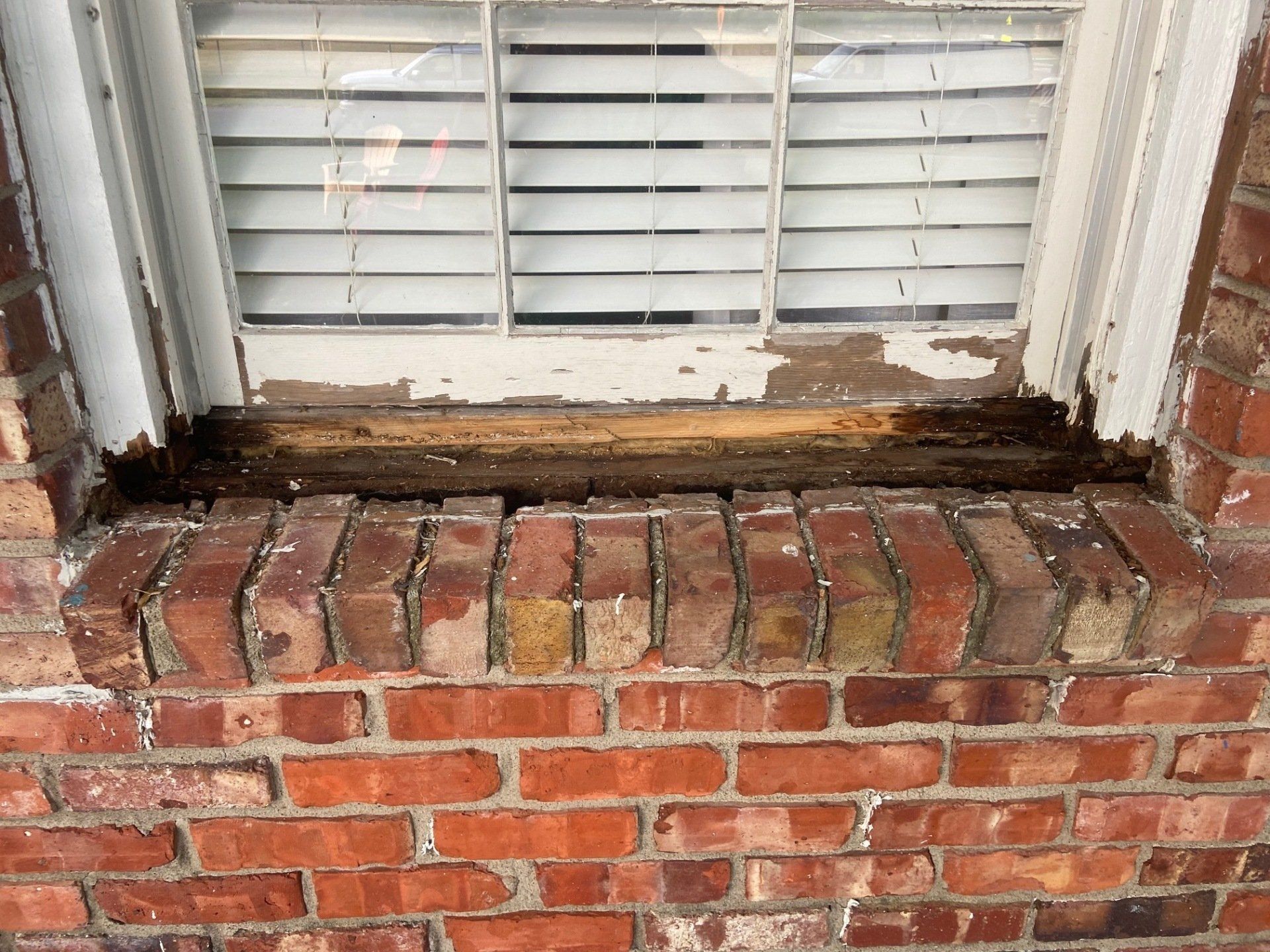 Window with Wood Rot Before Fixed