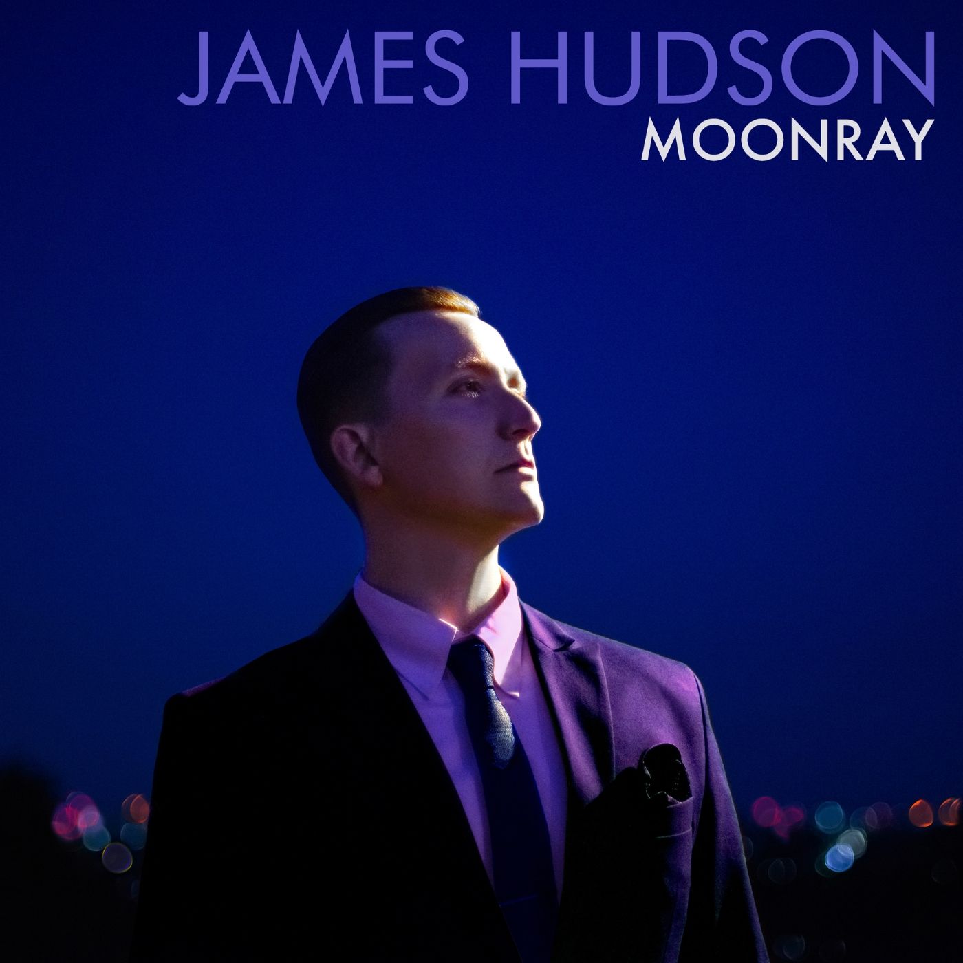 A man in a suit and tie is on the cover of james hudson moonray