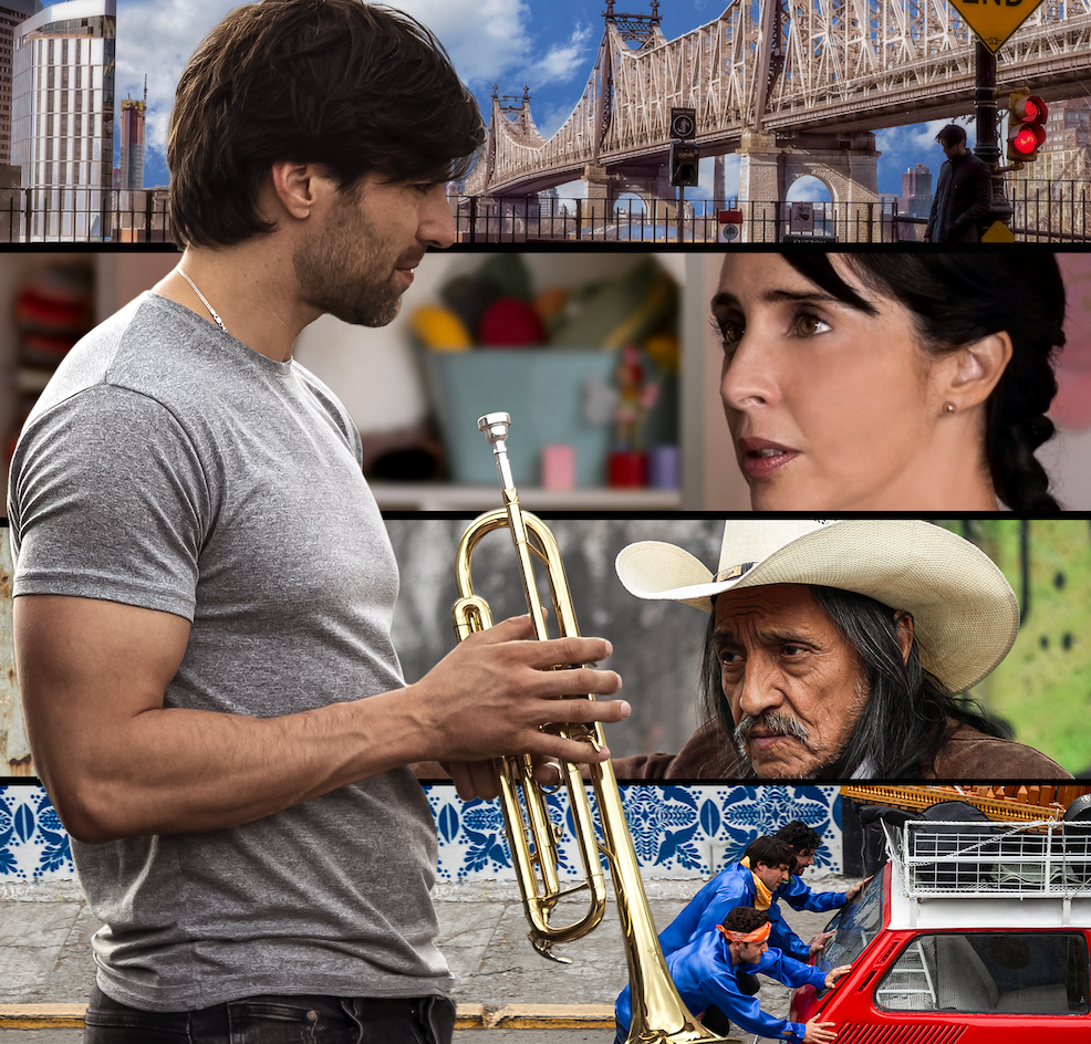 A man is holding a trumpet in front of a woman and a man in a cowboy hat