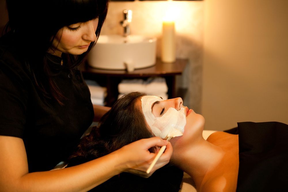 Woman Receiving a Facial Mask at a Spa — Bombshell Body Bar In Meikleville Hill, QLD
