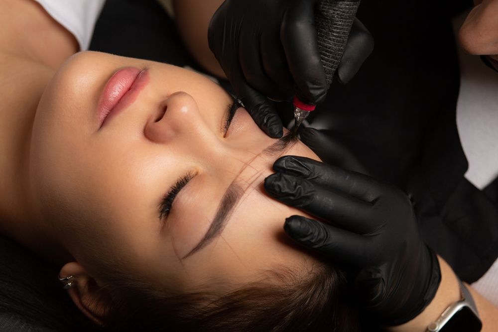 Person Getting Eyebrow Microblading — Bombshell Body Bar In Meikleville Hill, QLD