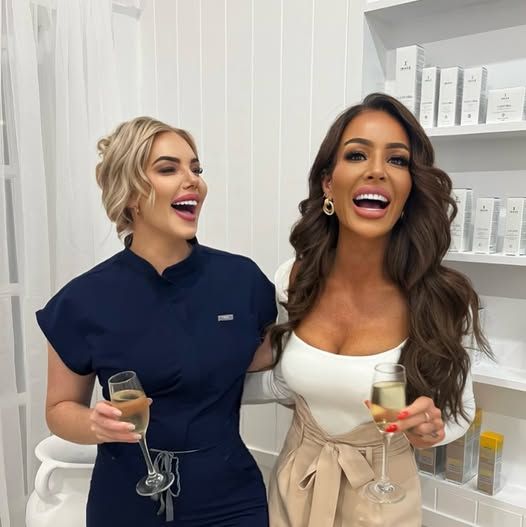 Two Smiling Women With Champagne — Bombshell Body Bar In Meikleville Hill, QLD
